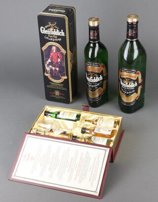 A litre bottle of Glenfiddich Special Reserve single malt whisky, a 70cl bottle of Glenfiddich single malt pure whisky with metal presentation tin and a 1980's "The Singles Bar" collection of fine Scotch whiskies from Invergordon Distilleries Group in a book style presentation case with tasting glass  including Invergordon 10 year old, Tullibardine, Tamnavulin-Glentlivet, Isle of Jura 10 year old and Bruichladdich 10 year old single malt whisky 