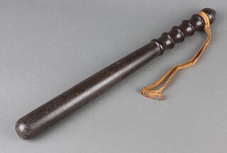 An unmarked turned wooden Police truncheon 