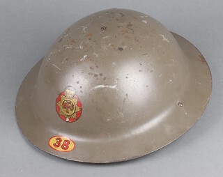 A Second World War Auxiliary Fire Service helmet marked 38, the strap marked 846548.38.C.3Y FW PM Heskett 