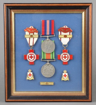 A Second World War pair of medals comprising British War medal and Victory medal together with 2 British Red Cross Proficiency and First Aid medals, 2 collar dogs, mounted in a frame 