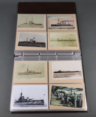 Of Naval interest, an album of 246 black and white and coloured postcards of Royal Naval ships, submarines etc