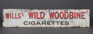 A rectangular white, red and black enamelled advertising sign, Wills's "Wild Woodbine Cigarettes" 39cm x 183cm