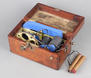 Dickson Dean and Co London, an electric shock machine contained in a mahogany case 10cm h x 19cm w x 10cm d 