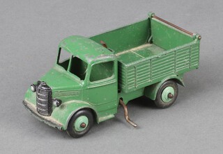 Dinky Toys, a Bedford End tipper truck 25M (dark green cab and truck body, light green hubs), unboxed, rust to base 