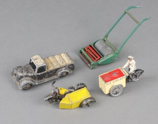 Eebee Toys, an ice cream vendor and dispatch motor bike and side car (both in poor order), a Dinky Super Toys lawn mower (broken)and a Timpo Toys 1947 pickup truck 