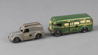 A Wells Brimtoy single decker green line Guildford to Hertford tin plate clock work bus in green together with a Tri-ang Minic post office telephone van (missing ladder) 