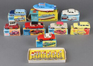 Corgi Toys, a collection of cars in reproduction boxes (all class play worn) to include Ford Zephyr 424, Sports Fastback 263, Ford Consul Classic 234, Lotus Elan Coupe, Jaguar 2.4 litre saloon 208, Mini Cooper S Monte Carlo 339 and Dolphin 20 Cruiser on trailer 104 and a Dinky Toys Vauxhall Victor 141 and a Dinky road signs set no.47 