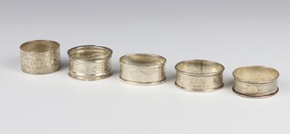 A silver napkin ring Birmingham 1931, 4 others, 64 grams 