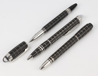 A Mont Blanc gentleman's ball point pen with chequer board matt finish case, a ditto ballpoint pen and a pen with no cap 