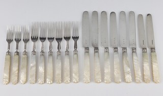 A matched set of Victorian silver plated and mother of pearl dessert eaters comprising 8 knives and 9 forks 