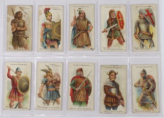 John Player and Sons cigarette cards, a binder of sets to include Arms and Armour, Cricketers (1930), Cricketers (1934), Cries of London Series 1 and 2, Wild Animal Heads, International Air Liners, War Decorations and Medals, Military Head Dress, Butterflies, Wild Birds, Fire Fighting Appliances and Military Uniforms of The British Empire Overseas 