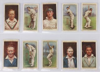 Wills cigarette cards, a binder of sets to include Cricketers 1928, Cricketers, Rugby Internationals, Old English Garden Flowers, English Period Costumes, Wonders of The Past, Arms of The British Empire, Arms of Foreign Cities, Historic Events, Signalling Series, Musical Celebrities, Coronation Series 