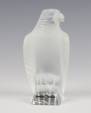 A Lalique frosted glass car mascot in the form of an eagle, engraved lower case marks Lalique France,  engraved LCS 1182 and with original label 12cm, boxed 