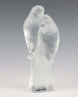 A Lalique frosted glass figure of 2 parakeets titled "Deux Perruches" etched lower case marks Lalique France, with original label, 18cm 