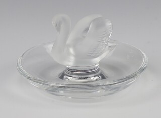 A Lalique frosted glass pin tray with a swan, etched lower case marks Lalique France, 8cm 