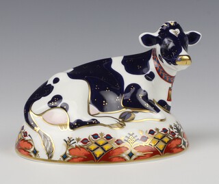 A Royal Crown Derby Imari pattern  paperweight  of a  friesian cow "Buttercup", silver stopper, 15cm 