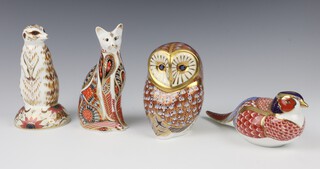 Four Royal Crown Derby Imari pattern paperweights - owl with gold stopper 10cm, pheasant ceramic stopper 18cm, cat gold stopper 13cm and meerkat silver stopper 13cm 