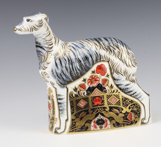 A Royal Crown Derby Imari pattern paperweight of a lurcher with gold stopper, 20cm 