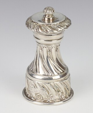 A Victorian repousse silver pepper mill with scroll decoration London 1898, 9cm 