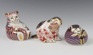 Three Royal Crown Derby Imari pattern paperweights - vole 6cm, beaver 9cm and bear cub 8cm, all with silver stoppers 