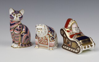 Three Royal Crown Derby Imari pattern paperweights - kitten 12cm, bull dog 7cm and Father Christmas in a sleigh 10cm, all without stoppers 