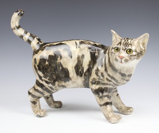 A Jenny Winstanley ceramic figure of a standing cat with glass eyes no.8, 30cm 