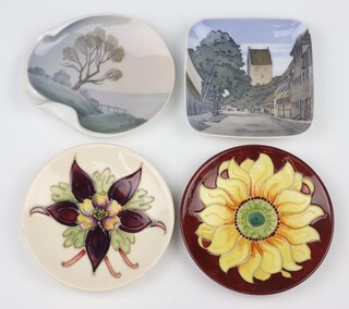 A Bing and Grondahl dish with landscape view 10cm, a Royal Copenhagen ditto with townscape 3439 10cm, a contemporary Moorcroft dish decorated a sunflower '94 11cm, ditto with flower 11cm  