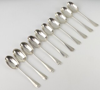 A set of 10 Victorian silver rat tail dessert spoons, London 1861, 512 grams 