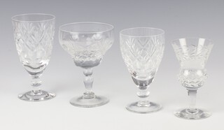 Six Scottish Crystal thistle shaped sherry glasses, 5 champagne coups, 6 large wines and 12 small wine glasses by Royal Doulton 