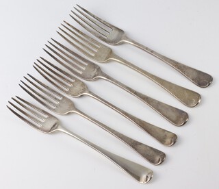 A matched set of Georgian and Victorian silver Old English table forks with engraved armorial, London 1815 and 1843, 409 grams 