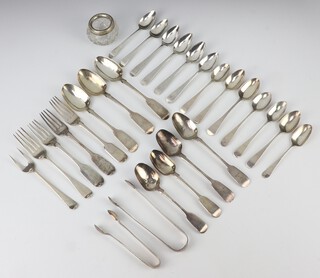 A pair of Georgian silver sugar nips and minor silver cutlery, 606 grams 