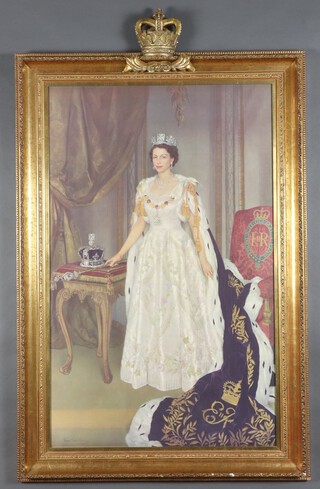 A 20th Century print of Her Majesty Queen Elizabeth II, contained in a fancy gilt frame with crown crest 95cm x 60cm 