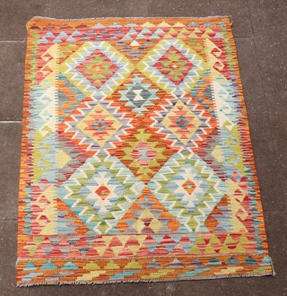 A yellow, green and orange ground Chobi Kilim with overall geometric design 142cm x 98cm 