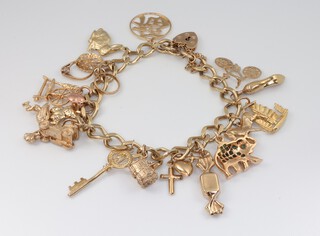 A 9ct yellow gold charm bracelet 36.8 grams 