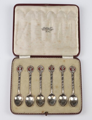 A cased set of 6 silver and enamelled commemorative teaspoons, Birmingham 1936, maker W H Haseler Ltd 