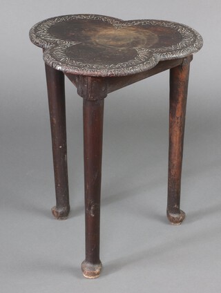 A 19th Century carved oak cricket table, the top in the form of an Ace of Clubs, raised on club supports 61cm h x 50cm diam. 