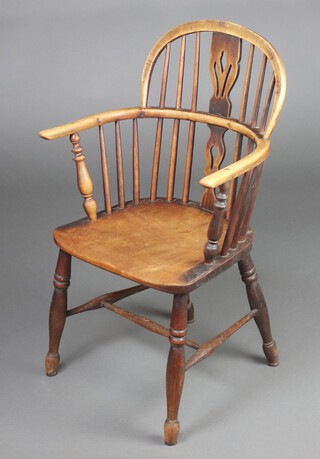 A 19th Century elm and beech comb back carver chair with solid seat, raised on turned supports with H framed stretcher 90cm h x 57cm w x 35cm d (seat 21cm x 25cm) 