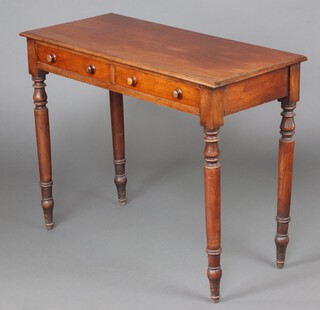 A Victorian mahogany side table fitted 2 drawers, raised on turned supports 76cm h x 99cm w x 43cm d 