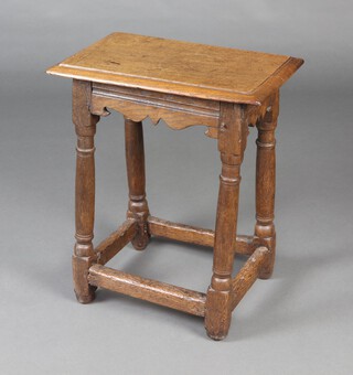 An 18th Century style oak joined stool, raised on turned and block supports with box framed stretcher 54cm h x 56cm w x 29cm d  