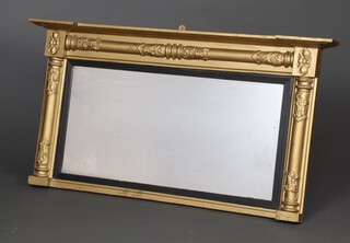 A Regency rectangular plate over mantel mirror contained in a gilt frame with columns to the sides 60cm h x 111cm w x 12cm d 