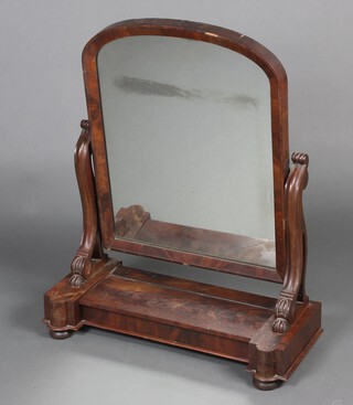 A Victorian arched plate dressing table mirror contained in a mahogany swing frame, the base fitted a secret compartment with hinged lid 81cm h x 54cm w x 28cm d 