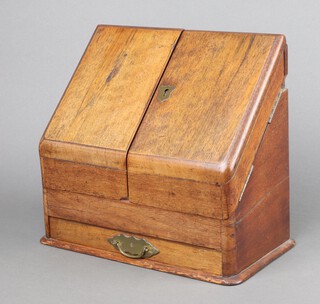 A Victorian mahogany wedge shaped stationery box with stepped interior, the base fitted a drawer 27cm h x 31cm w x 16cm d 