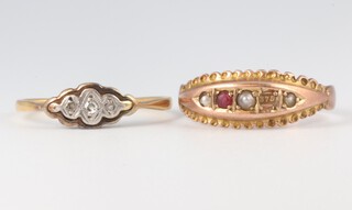 An 18ct yellow gold diamond ring 1.4 grams size L 1/2 and a 9ct yellow gold ruby and seed pearl ring (lacking 1 stone) 1.6 grams size L 1/2