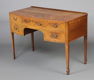 A Georgian style crossbanded and inlaid mahogany dressing/writing table with raised back, fitted 1 long and 4 short drawers, raised on square tapered supports, spade feet 76cm h x 107cm w x 57cm d 