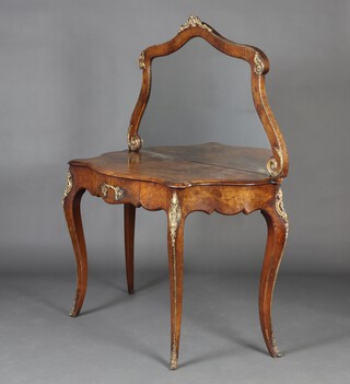 A Victorian inlaid and figured walnut console table of serpentine outline, the back fitted a mirror, the base fitted a drawer, having gilt metal mounts throughout, raised on cabriole supports  144cm h x 114cm w x 48cm d 