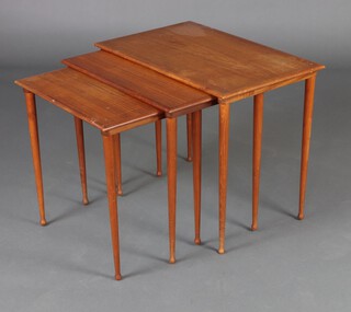 BC Mobler, Vejle, a nest of 3 mid-Century rectangular teak coffee tables, raised on drum stick supports - 49cm h x 59cm w x 38cm d, 48cm x 52cm x 36cm and 46cm x 45cm x 34cm 