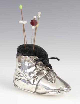 A large George V silver pin cushion in the form of a boot, Birmingham 1911, 11cm 