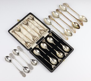 Six 800 standard spoons with filigree handles, 6 ditto forks and 10 similar spoons, 342 grams 