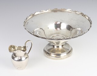 A silver tazza with wavy rim Birmingham 1937 and a miniature cream jug 66 grams