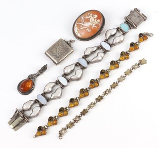 A silver and shell bracelet, 1 other, a brooch and 3 pendants